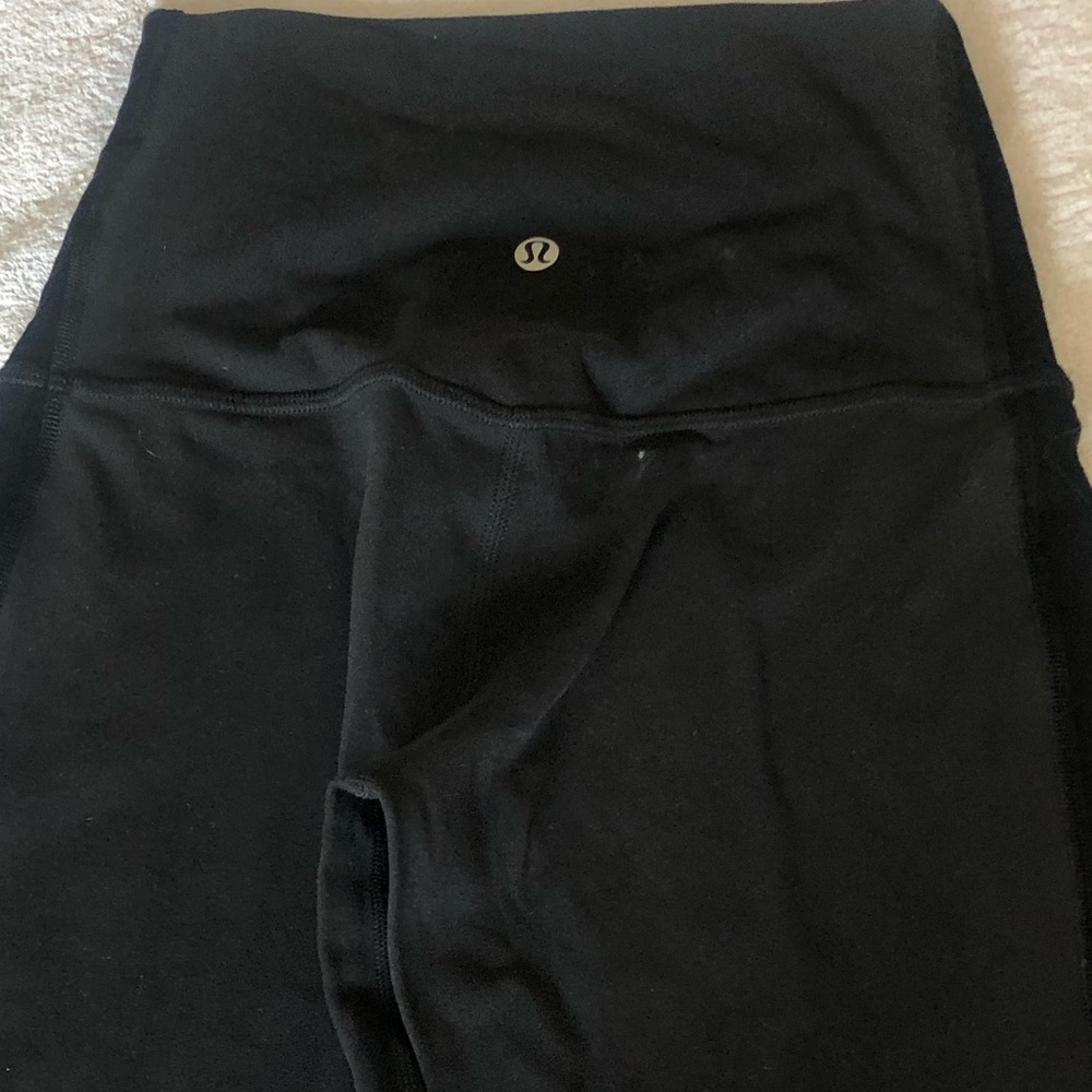 Align Lululemon black pants with velvet trim